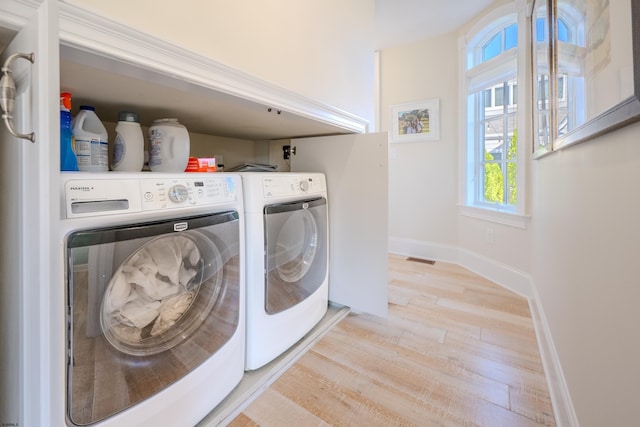 25 S Union Ave, Margate, NJ 08402 - washroom with light wood finished floors, washing machine and dryer, and baseboards