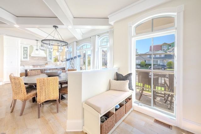 25 S Union Ave, Margate, NJ 08402 - dining room with coffered ceiling, light wood finished floors, beamed ceiling, and a chandelier