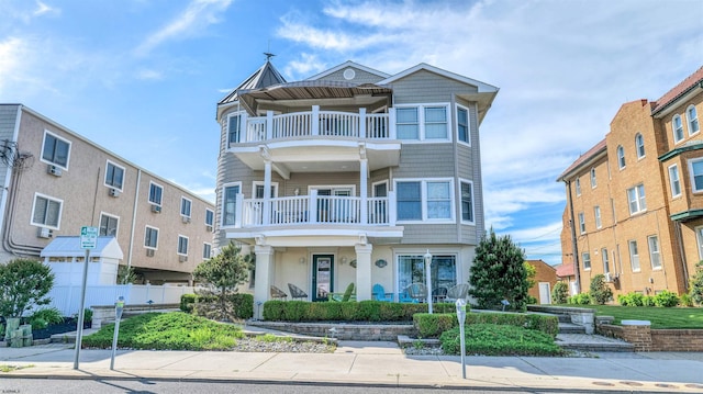1312 Ocean Ave Unit 1, Ocean City, NJ 08226 - townhome / multi-family property with a balcony and stucco siding