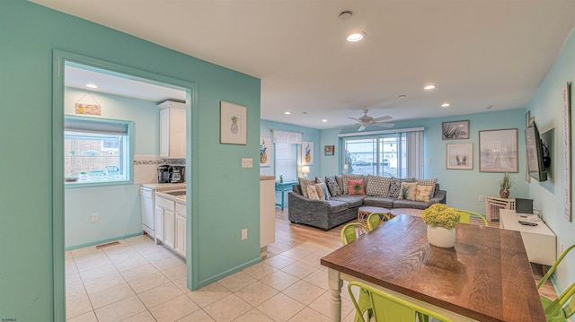 1312 Ocean Ave Unit 1, Ocean City, NJ 08226 - living area with recessed lighting, light tile patterned floors, ceiling fan, and baseboards