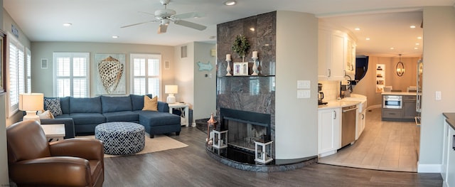 2608 Oberon Ave, Longport, NJ 08403 - living room featuring light wood-type flooring, ceiling fan, recessed lighting, and a high end fireplace