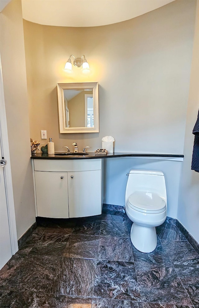2608 Oberon Ave, Longport, NJ 08403 - bathroom featuring baseboards, vanity, toilet, and marble finish floors