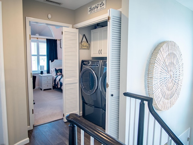 2608 Oberon Ave, Longport, NJ 08403 - laundry room featuring cabinet space, washing machine and dryer, dark wood-style floors, and baseboards