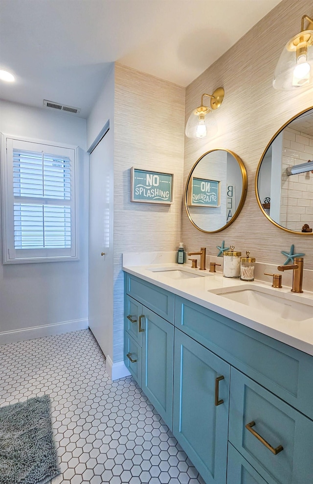 2608 Oberon Ave, Longport, NJ 08403 - bathroom featuring double vanity and baseboards
