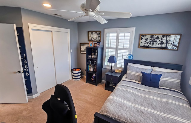 2608 Oberon Ave, Longport, NJ 08403 - bedroom with light carpet, a closet, a ceiling fan, and baseboards