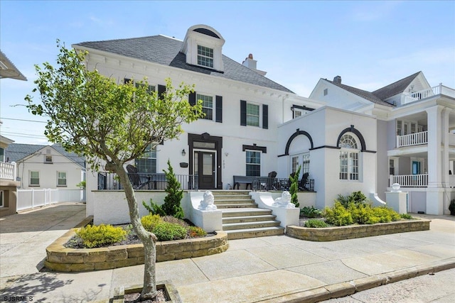 103 S Austin Ave, Ventnor, NJ 08406 - view of front of property with a chimney and stucco siding