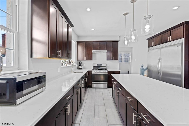 103 S Austin Ave, Ventnor, NJ 08406 - kitchen with stainless steel appliances, a sink, plenty of natural light, decorative light fixtures, and recessed lighting