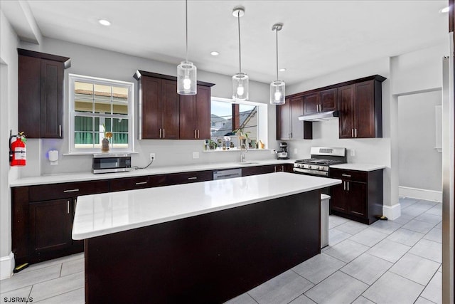 103 S Austin Ave, Ventnor, NJ 08406 - kitchen with stainless steel appliances, under cabinet range hood, a sink, light countertops, and recessed lighting