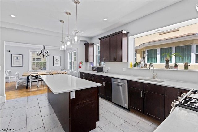 103 S Austin Ave, Ventnor, NJ 08406 - kitchen featuring dishwasher, a sink, light tile patterned floors, light countertops, and a kitchen island
