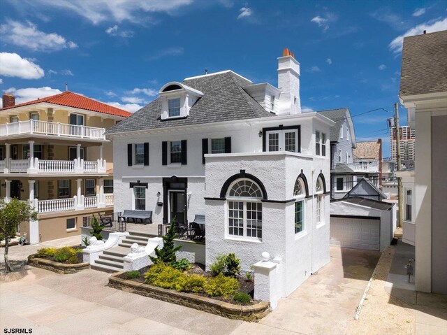 103 S Austin Ave, Ventnor, NJ 08406 - view of front of house with a chimney and a garage