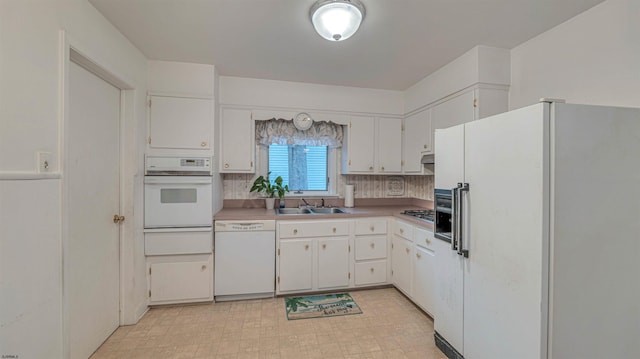 205 Ridgewood Dr, Northfield, NJ 08225 - kitchen with white appliances, a sink, light countertops, and white cabinetry