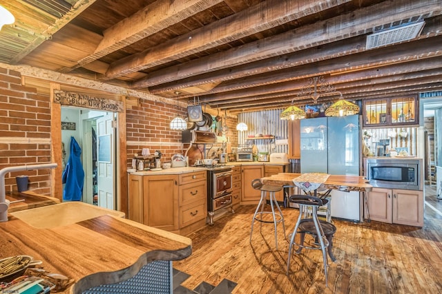 2774 N Rte 9, Ocean View, NJ 08260 - kitchen featuring stainless steel appliances, wood ceiling with exposed beams, brick wall, light wood-style flooring, and light countertops