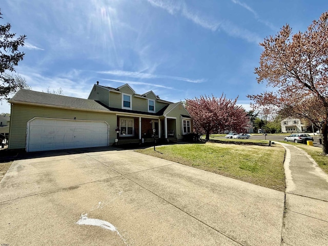 2 King William, Sewell, NJ 08080 - traditional home with a front yard, an attached garage, covered porch, and driveway
