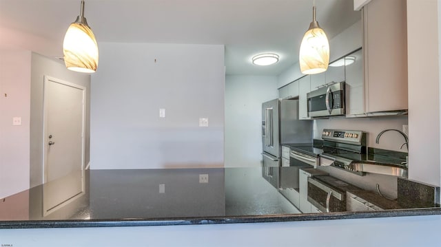 903 Harbour Cv Unit 903, Somers Point, NJ 08244 - kitchen featuring stainless steel appliances, a peninsula, and decorative light fixtures