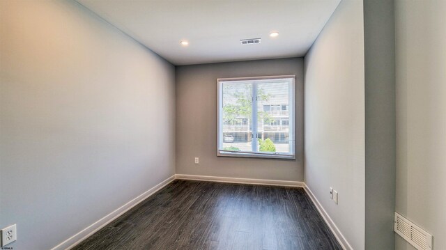 903 Harbour Cv Unit 903, Somers Point, NJ 08244 - spare room featuring dark wood-type flooring, baseboards, and recessed lighting