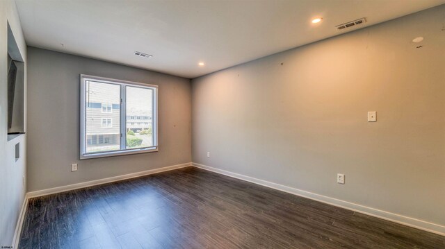 903 Harbour Cv Unit 903, Somers Point, NJ 08244 - unfurnished room with dark wood-style flooring, baseboards, and recessed lighting