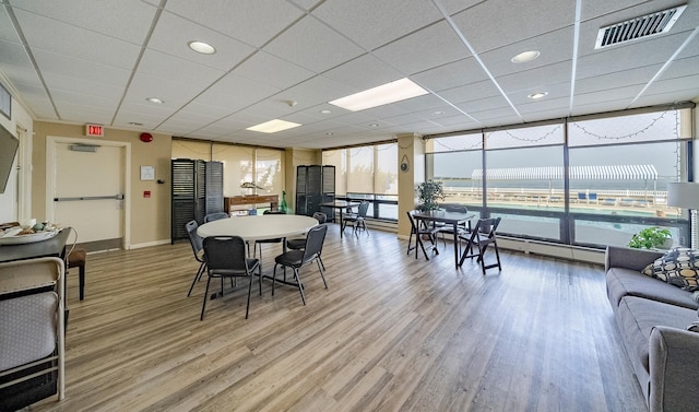 500 Bay Ave Unit 404South, Ocean City, NJ 08226 - dining room featuring baseboards, light wood-type flooring, recessed lighting, and a baseboard heating unit