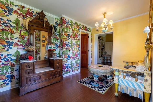 622 Central Ave, Linwood, NJ 08221 - dining space with a chandelier, baseboards, ornamental molding, wallpapered walls, and wood finished floors