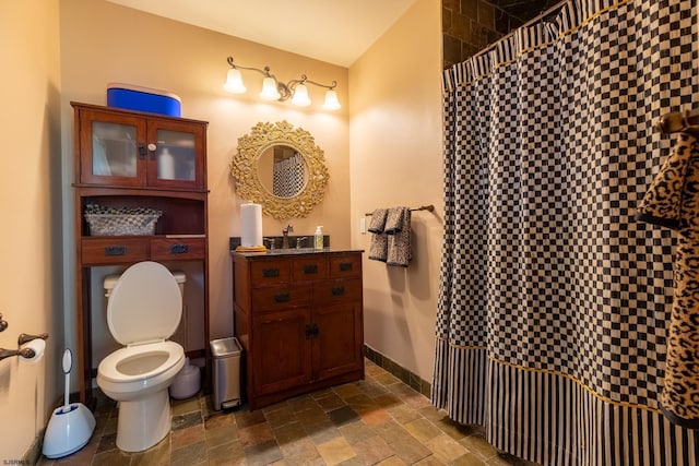 622 Central Ave, Linwood, NJ 08221 - full bathroom with toilet, stone tile flooring, vanity, and curtained shower