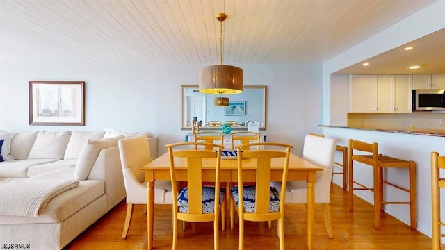 4540 W Brigantine Ave Unit N208, Brigantine, NJ 08203 - dining room with light wood finished floors, recessed lighting, and wood ceiling