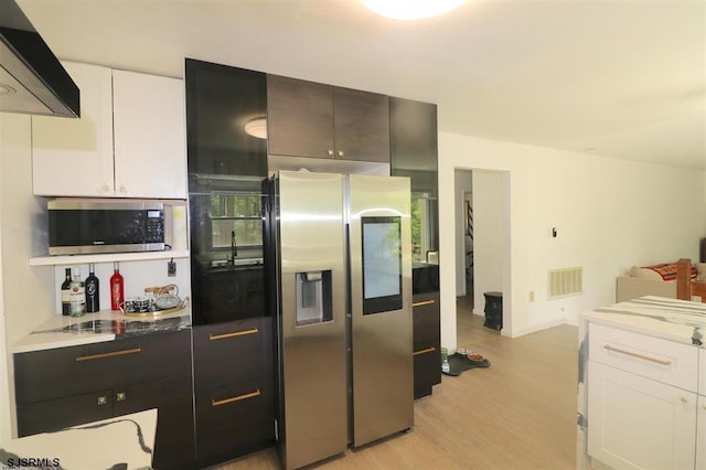 200 Linda Ln, Galloway Township, NJ 08205 - kitchen featuring stainless steel appliances, exhaust hood, light wood-style flooring, white cabinetry, and baseboards