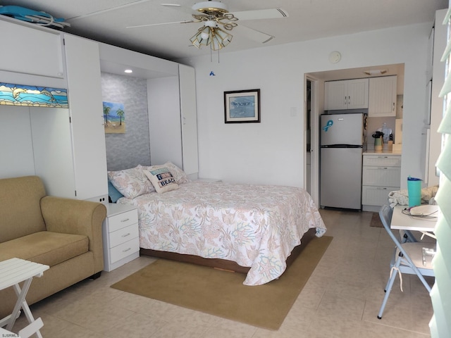 3501 Boardwalk Unit A228, Atlantic City, NJ 08401 - bedroom with freestanding refrigerator, ceiling fan, and light tile patterned flooring