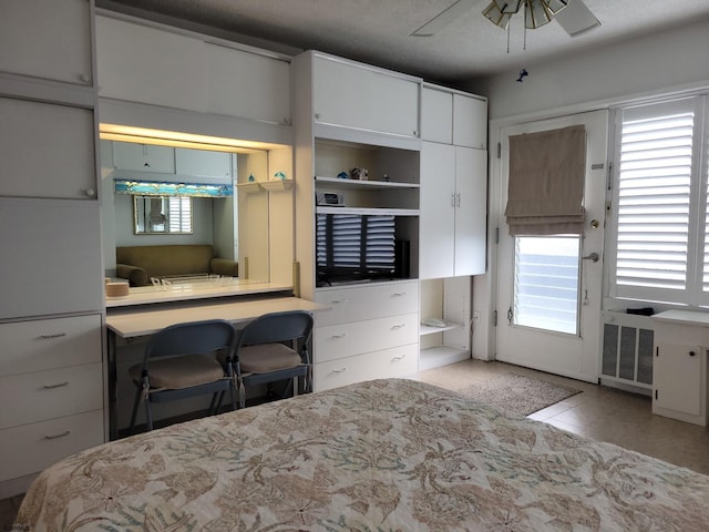 3501 Boardwalk Unit A228, Atlantic City, NJ 08401 - bedroom featuring tile patterned floors, a ceiling fan, and access to exterior