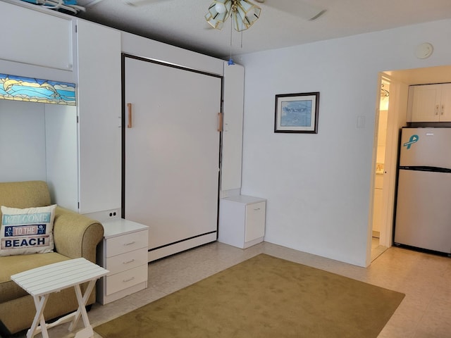 3501 Boardwalk Unit A228, Atlantic City, NJ 08401 - living area with light flooring and a ceiling fan