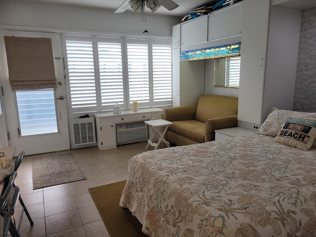 3501 Boardwalk Unit A228, Atlantic City, NJ 08401 - bedroom featuring light tile patterned flooring and a ceiling fan