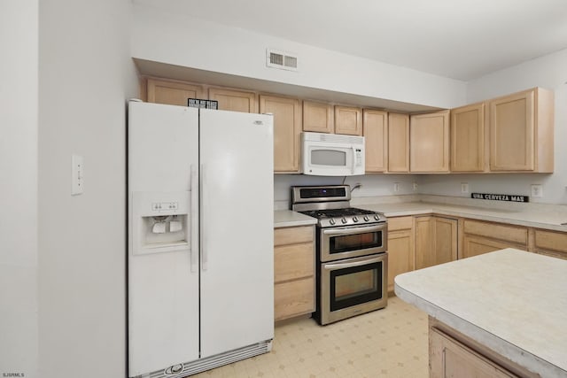 101 Sycamore Ave, Egg Harbor Township, NJ 08234 - kitchen featuring white appliances, light brown cabinets, light flooring, and light countertops