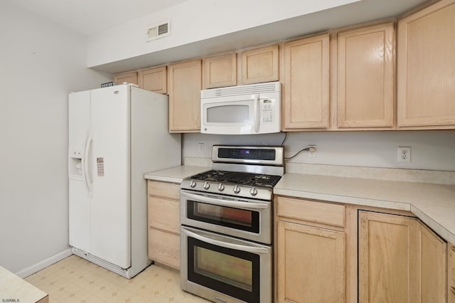101 Sycamore Ave, Egg Harbor Township, NJ 08234 - kitchen with light brown cabinetry, white appliances, light flooring, light countertops, and baseboards