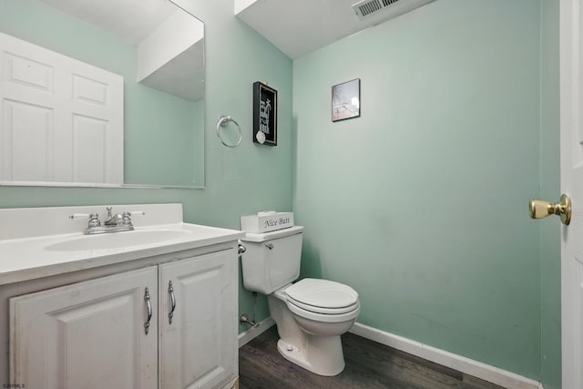 101 Sycamore Ave, Egg Harbor Township, NJ 08234 - half bath with toilet, wood finished floors, baseboards, and vanity