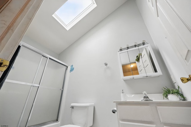 101 Sycamore Ave, Egg Harbor Township, NJ 08234 - bathroom featuring toilet, a shower with shower door, a skylight, vanity, and vaulted ceiling