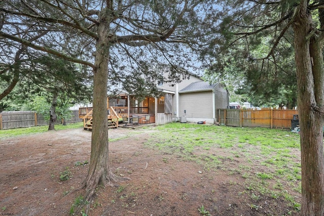 101 Sycamore Ave, Egg Harbor Township, NJ 08234 - rear view of house with a fenced backyard and a deck