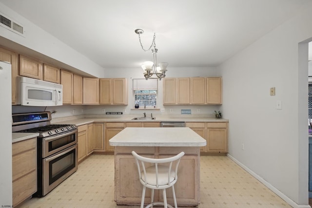 101 Sycamore Ave, Egg Harbor Township, NJ 08234 - kitchen with appliances with stainless steel finishes, light brown cabinets, light floors, and a sink