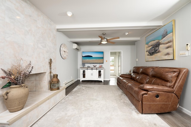 608 Delavan Ave, Margate, NJ 08402 - living room featuring a baseboard radiator, a wall mounted air conditioner, wood finished floors, beam ceiling, and a ceiling fan