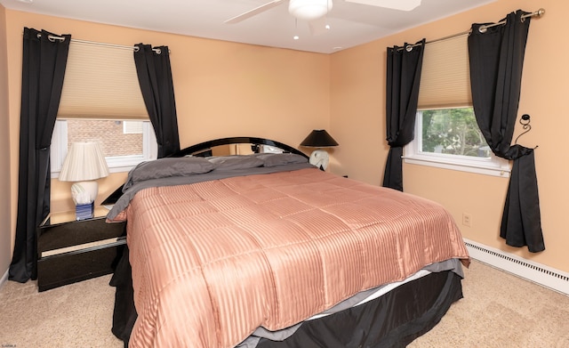 608 Delavan Ave, Margate, NJ 08402 - carpeted bedroom featuring a baseboard heating unit, baseboards, and a ceiling fan
