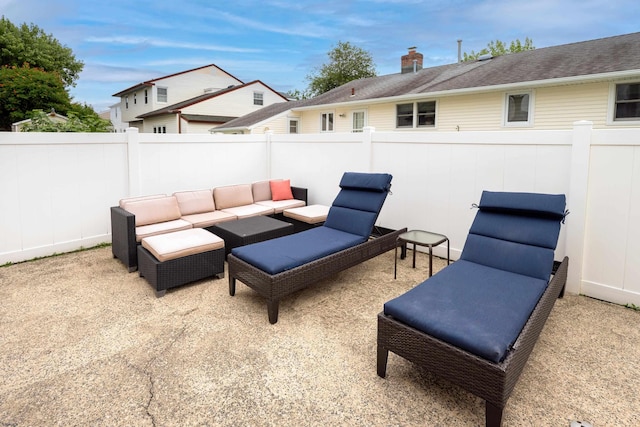 608 Delavan Ave, Margate, NJ 08402 - fenced backyard featuring an outdoor living space and a patio area