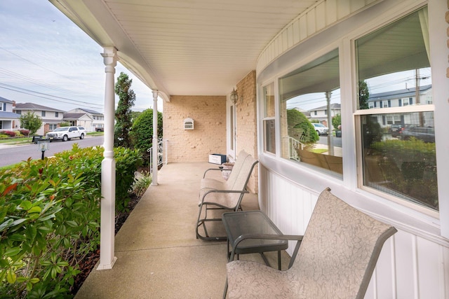 608 Delavan Ave, Margate, NJ 08402 - porch featuring a residential view