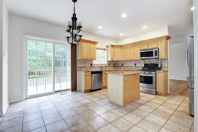 2511 Long Ave, Mays Landing, NJ 08330 - kitchen with stainless steel appliances, light brown cabinets, decorative backsplash, a center island, and recessed lighting
