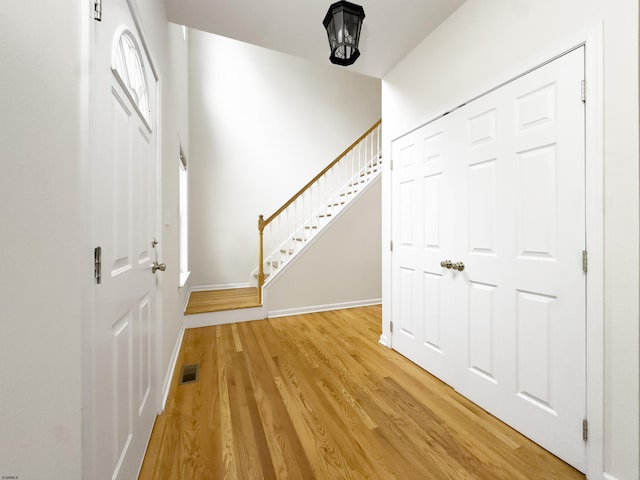 2511 Long Ave, Mays Landing, NJ 08330 - foyer entrance with stairs, light wood-type flooring, and baseboards