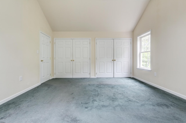 2511 Long Ave, Mays Landing, NJ 08330 - unfurnished bedroom featuring vaulted ceiling, multiple closets, dark carpet, and baseboards