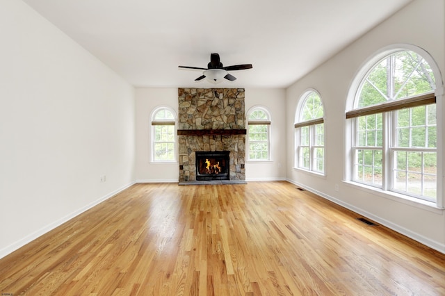 2511 Long Ave, Mays Landing, NJ 08330 - unfurnished living room featuring light wood-type flooring, baseboards, ceiling fan, and a fireplace