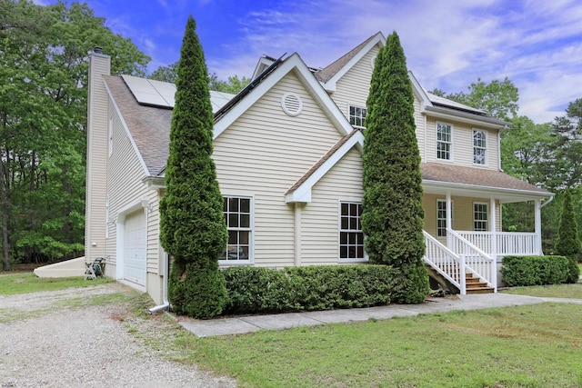 2511 Long Ave, Mays Landing, NJ 08330 - traditional-style house featuring covered porch, gravel driveway, roof mounted solar panels, a shingled roof, and stairway