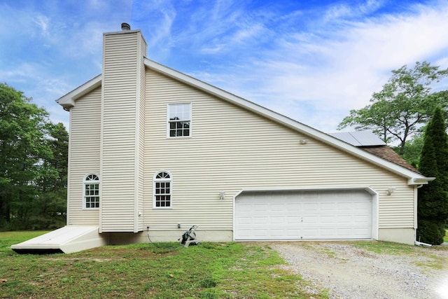 2511 Long Ave, Mays Landing, NJ 08330 - view of home's exterior featuring a garage, a chimney, and gravel driveway