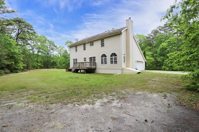 2511 Long Ave, Mays Landing, NJ 08330 - back of property with a chimney, a deck, a garage, and a yard
