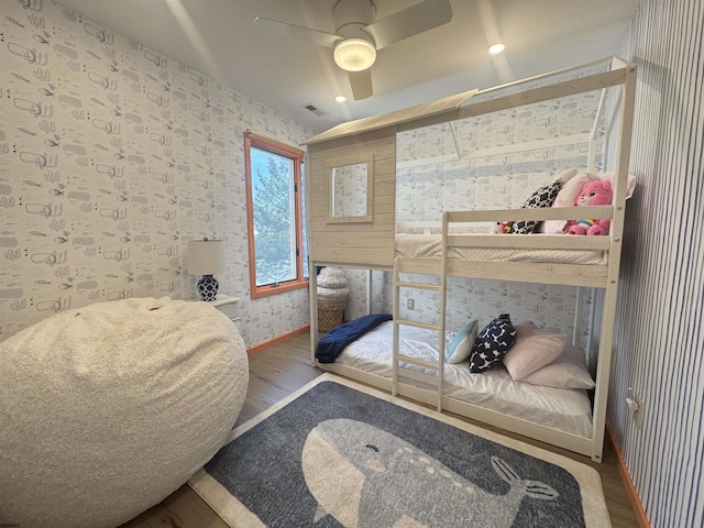 13 Delmar Ln, Brigantine, NJ 08203 - bedroom featuring wallpapered walls, wood finished floors, baseboards, and a ceiling fan