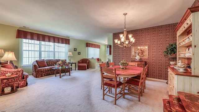 50 Derby Dr, Galloway Township, NJ 08205 - dining area featuring a chandelier, light colored carpet, healthy amount of natural light, and wallpapered walls