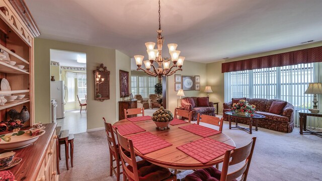 50 Derby Dr, Galloway Township, NJ 08205 - carpeted dining area with a chandelier