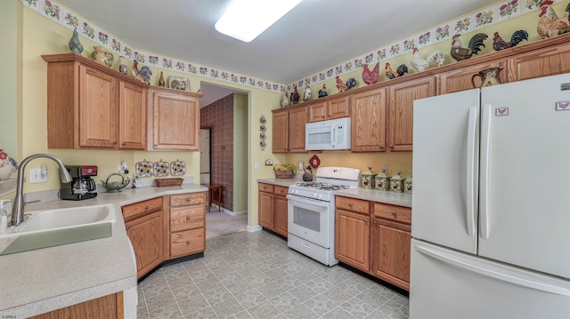 50 Derby Dr, Galloway Township, NJ 08205 - kitchen featuring white appliances, a sink, light countertops, light flooring, and wallpapered walls